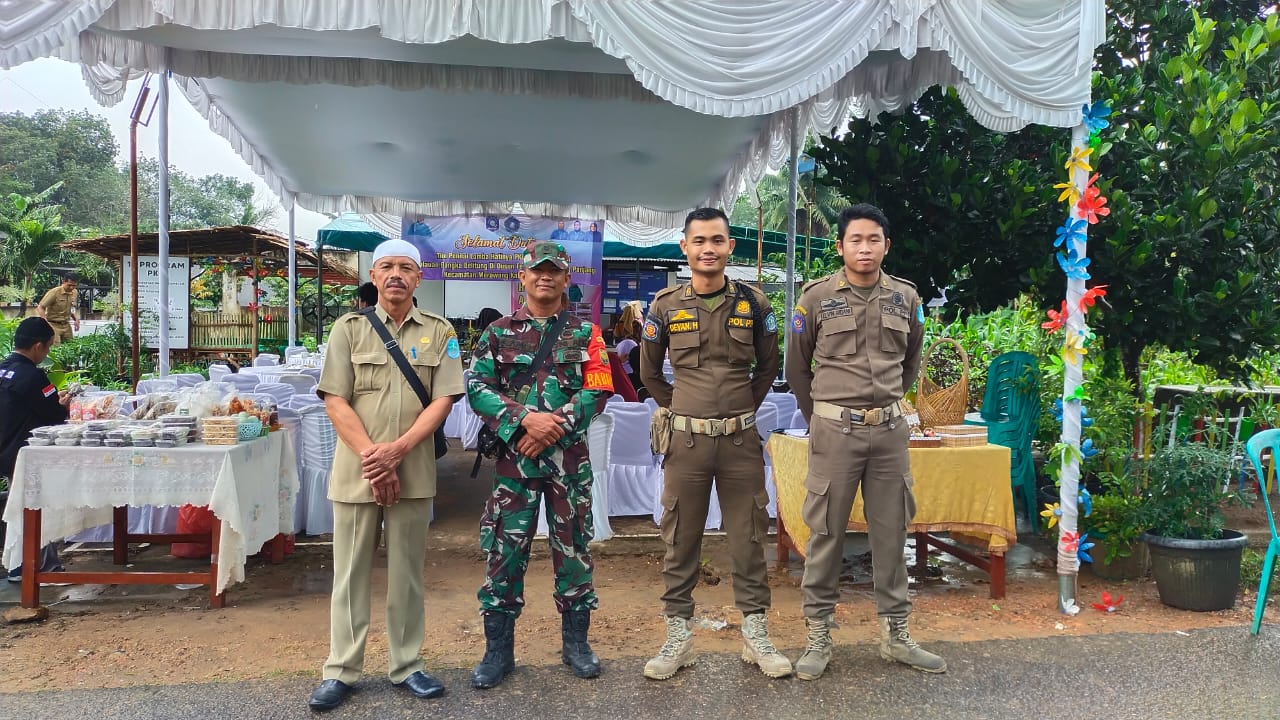 Danramil 0413-03/Merawang Dampingi Ketua Persit Ranting 04/Merawang Hadiri Penilaian Lomba PKK Tingkat Provinsi