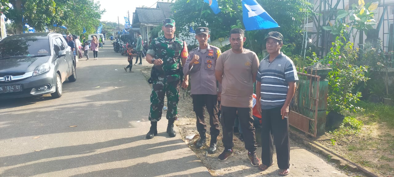 Jaga Keselamatan Warga Saat Berkendaraan Babinsa Bakam Bersama Bhabinkamtibmas Laksanakan Himbauan